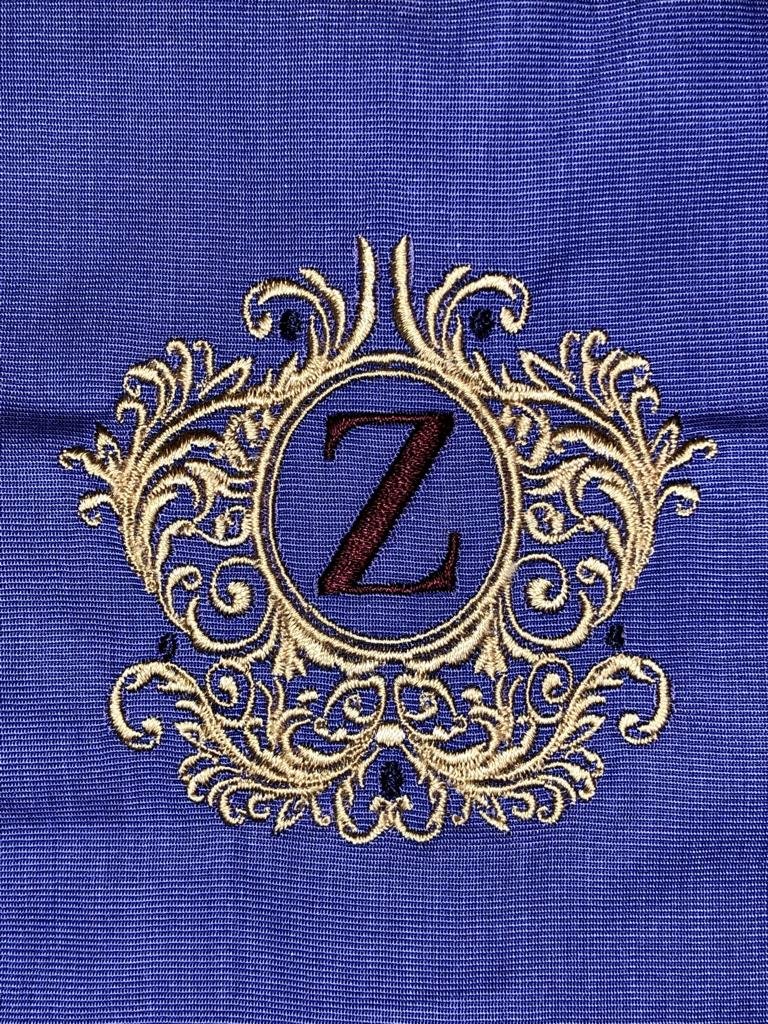 Artisanal Monogramming: Personalized Crest & Initial Embroidery on Pure Wool